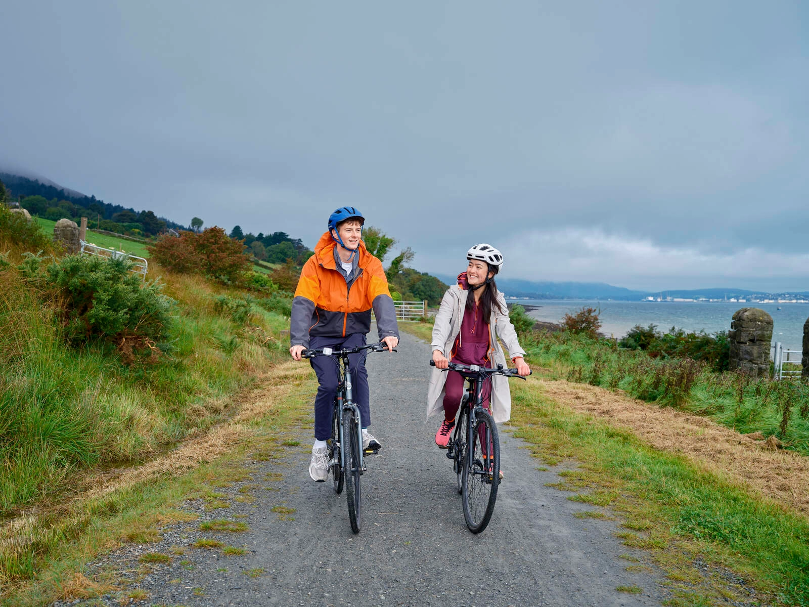 A couple cycling on the Carlingford Lough Greenway